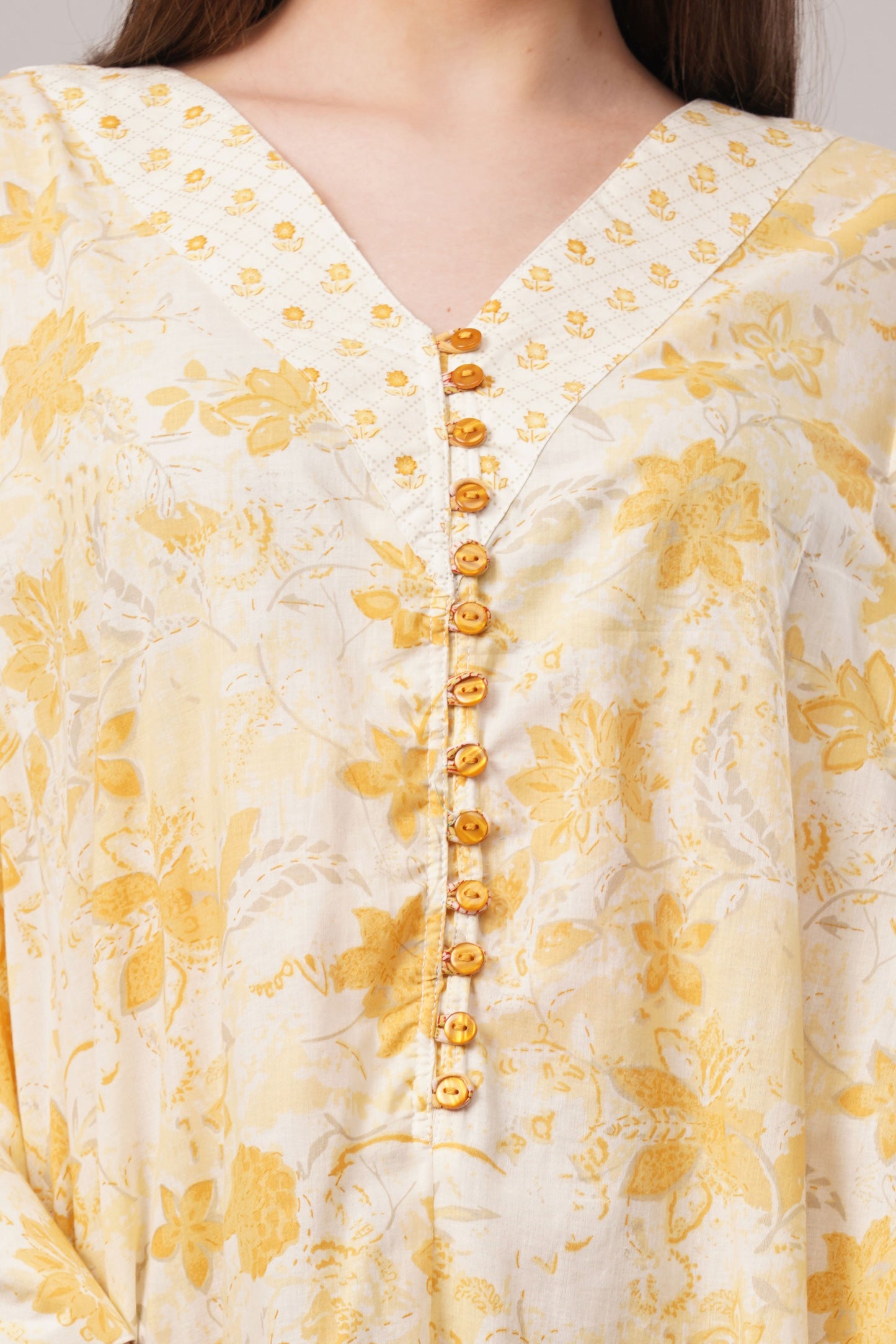 White Cotton Dress with Yellow Florals – Soft Elegance with Buttoned V-Neck