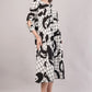 Monochrome Abstract Cotton Dress– Artistic Grid Print with High-Low Hem