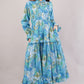 Tropical Blue Cotton Dress– Leafy Print with Bow Tie Neck & Tiered