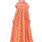 Woman wearing a floral dress on a white background