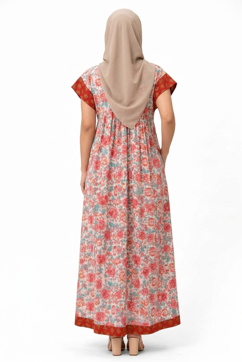 Woman wearing a floral dress with a beige hijab on a white background