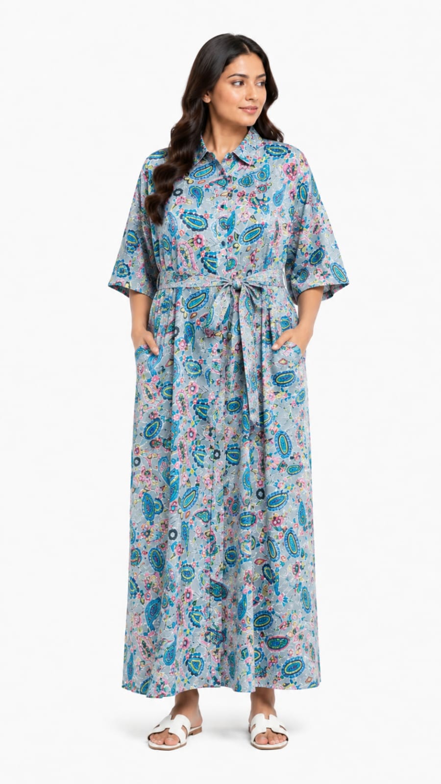 Woman wearing a floral dress on a white background