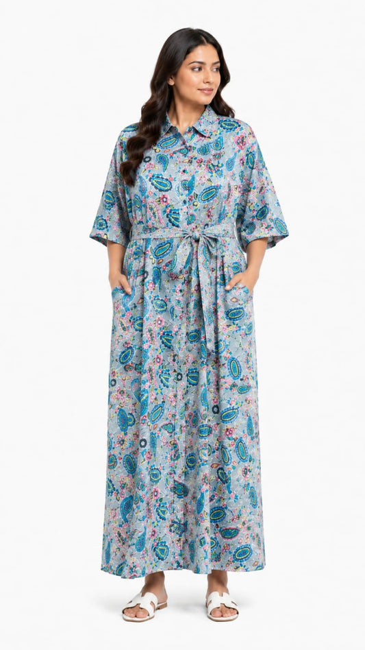 Woman wearing a floral dress on a white background