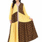 Woman wearing a yellow and brown patterned dress on a white background